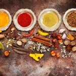 Indian spices on a concrete background