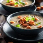 Creamy mushrooms soup as aromatic and hot starter.